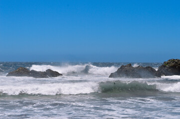 waves crashing on rocks