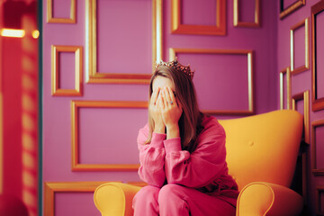 Sad Depressed Rich Royal Person Covering her Face Crying. Richness not making a queen happy...
