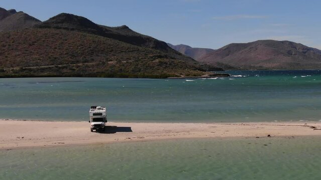 Aerial of RV camped on sand spit in beautiful Bah&iacute;a  Concepci&oacute;n Baja California Sur