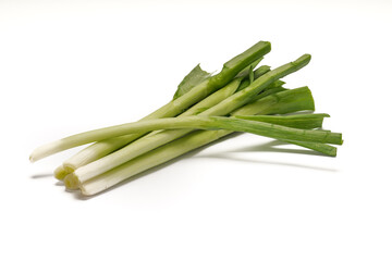 Green onions close-up on white background