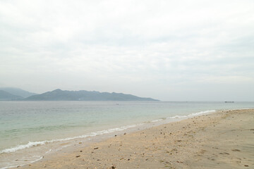 Lombok and Gili Air islands, overcast, cloudy day, sky and sea. Sunny day, sand beach.
