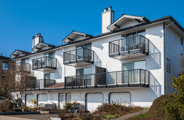Obraz premium New residential townhouses. Modern apartment buildings in Canada. Modern complex of apartment buildings