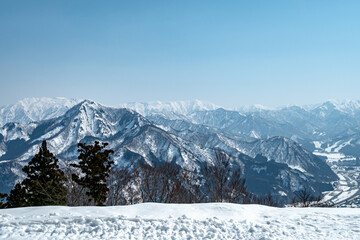 Fototapeta na wymiar Beautiful snow mountain view , yuzawa , Japan ,Winter landscape views is snow
