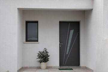 new modern grey aluminum door house gray white facade entrance street suburban home - obrazy, fototapety, plakaty