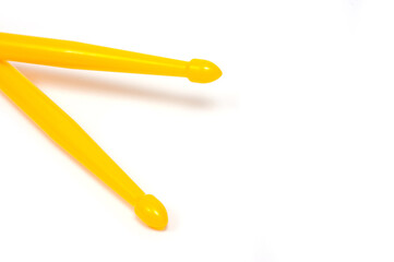Set of drum sticks professional yellow nylon for playing percussion instruments.
