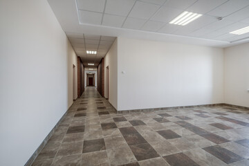 Fototapeta premium interior of empty white room hall or corridor with repair