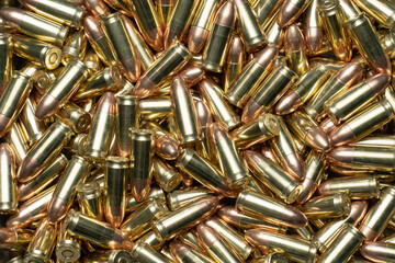 9mm caliber pistol cartridges, photo texture.