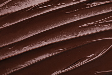 Delicious chocolate paste as background, top view