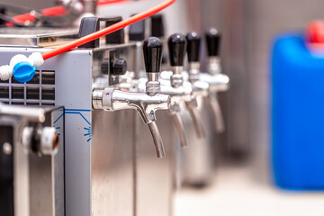 beer tap equipment in a restaurant in a brewery
