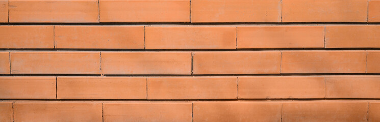 Orange brick wall as background. Banner design