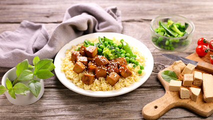 plate with fried tofu and vegetables