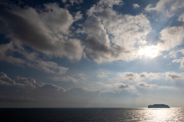 clouds and small islands and the sea and light