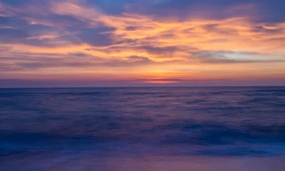 Foto op Plexiglas sunrise on the beach © максим тищенко