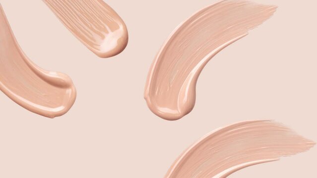 cosmetic smear foundation cream foundation on a beige background