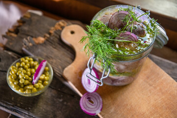 appetizer of herring with onions marinated in mustard-vinegar sauce, recipe
