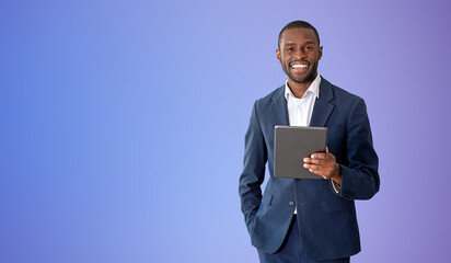 African man with tablet, purple background
