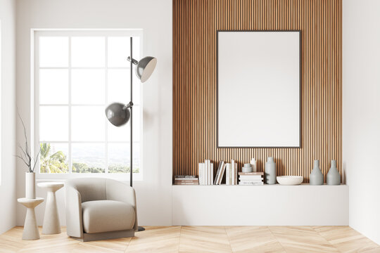 Cozy living room interior shelf and armchair near window, mockup photo frame