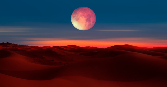 Beautiful sand dunes in the Sahara desert at sunrise with super full moon - Sahara, Morocco "Elements of this image furnished by NASA"
