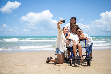 Happy holidays with family. Travel and vacations concept. Happy Asian family and woman elderly...