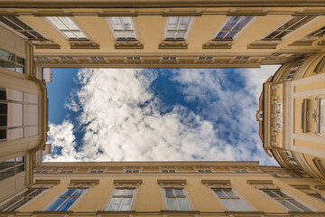 Bottom-up view from the rectangular courtyard of an art deco building, Vienna, Austria