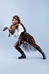 Country girl with viola on the grey background.