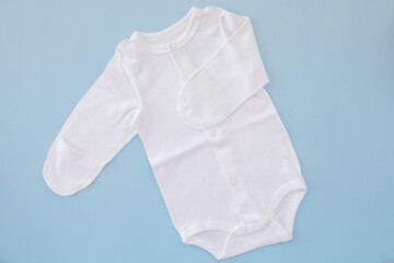 Mockup flat lay white bodysuit for on a blue background