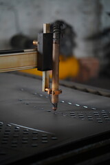 laser cutting machine working with sheet metal with sparks metalworking industrial manufacturing factory,machine working
