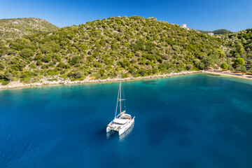 Aerial view of a moored yacht near Dexia beach on Itaca island, Greece - 582674864