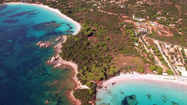 Best beaches of Corsica island. Aerial drone video of three beaches near Porto Vecchio - Palombaggia, Tamaricciu, Folaca with turquoise sea and white sand