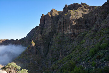 Naklejka premium Mountains with fog at Masca, in Tenerife in Spain