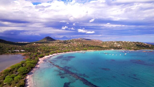 Best beaches of Corsica island. Aerial drone video of three beaches near Porto Vecchio - Santa Giulia with turquoise sea and white sand