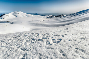 Scenic winter landscape with snow covered mountains, Campocatino, Italy