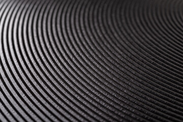 Macro texture of electric stove heating disk. Black heating element of hot plate cooktop background. Electric burner surface for cooking. Selective focus.