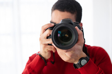Closeup portrait of man photographer taking photo
