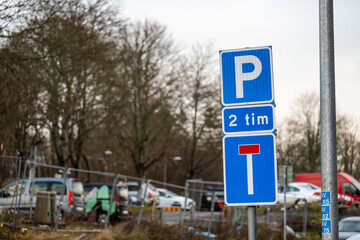 Fototapeta premium Road sign allowing parking for two hours.