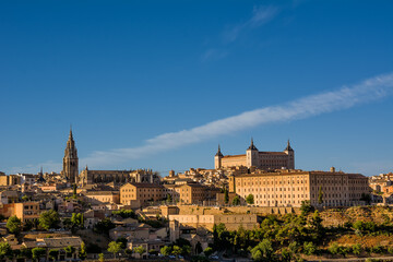 Fototapeta na wymiar Skyline of the old city of Toledo on the hill where the Old Cathedral and the Alcazar stand