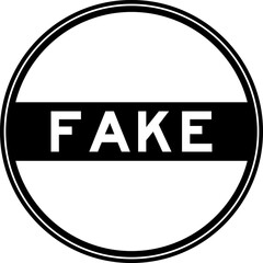 Black color round seal sticker in word fake on white background
