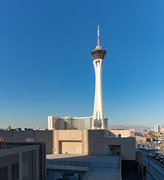 Las Vegas, United States - November 22, 2022: A picture of the STRAT Hotel, Casino and SkyPod as seen from the roof of another nearby hotel.