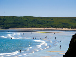 Shallow beach at afternoon (Tenby, Wales, United Kingdom, in summer)