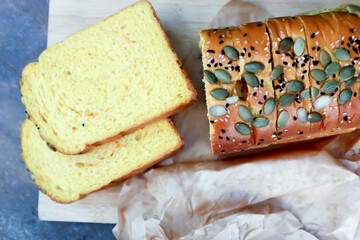 bread , pumpkin bread or loaf of bread or sliced bread or cut bread with pumpkin seed and sesame