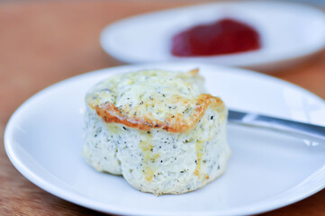 scone , sesame scone or scone with strawberry sauce