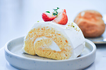 roll , cake roll or Swiss roll with strawberry