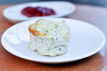 scone , sesame scone or scone with strawberry sauce