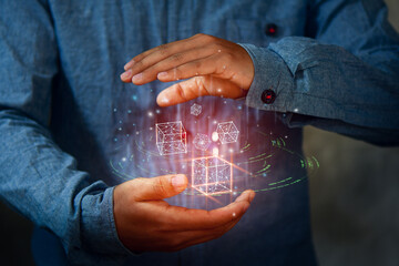 Man holding a 3d rendering blockchain a Digital Smiling Box Icon and many Futuristic Graphic to Connecting the Universe.