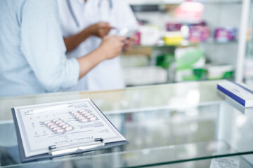 Asian woman pharmacist Helping Customer with Medicine at Pharmacy Drugstore