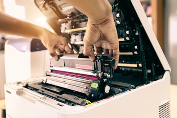 Technician hand open cover printer photocopier or photocopy to replace ink cartridges or fix paper...