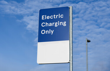Electric recharging point for vehicle car or bike free no charge in car parking space