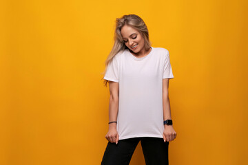 young lady in a white t-shirt mocap on a yellow background