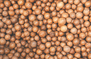 macadamia nuts texture background, fresh natural shelled raw macadamia nuts in a full frame, close up pile of roasted macadamia nut