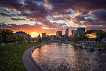 Vilnius Old Town with Beautiful Sunset Light. Cloudy Sky. River Neris in Background. Vilnius is Capital of Lithuania.